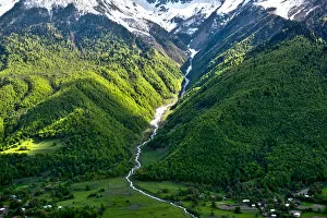 Horizontal view on Waterfall at Mountain road at Mount Ushba in the Caucasus of Georgia