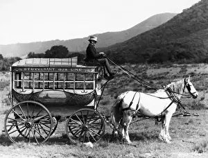 Horse-Drawn Stagecoach in Hills
