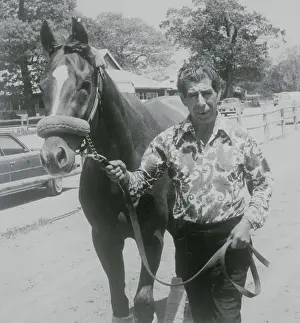 Leading Prints: Horse Groomer Juan Alaniz Leading Affirmed