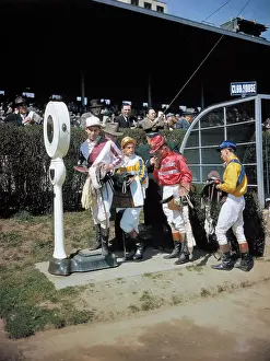Horse Racing Jockeys Being Weighed
