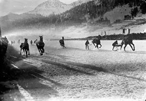 Horses Pull People on Frozen Lake
