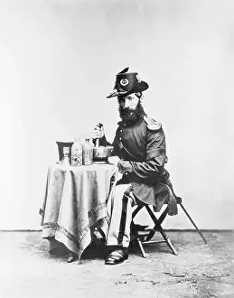 Hospital Steward Grinding Medication with Mortar and Pestle
