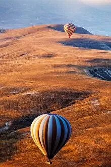 Hot air balloon over beautiful landscape