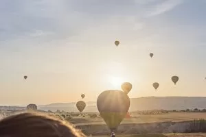 Aerial Collection: Hot air balloon flying over Cappadocia at morning