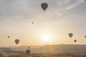 Images Dated 23rd September 2015: Hot air balloon flying over Cappadocia at morning