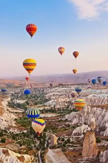 Anatolia Collection: Hot air balloon flying over Cappadocia Turkey