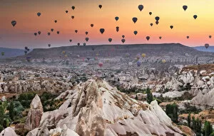 Images Dated 22nd September 2015: Hot air balloon flying over rock landscape at Capp
