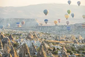 Levitation Prints: Hot air balloon flying over rock landscape at Cappadocia Turkey