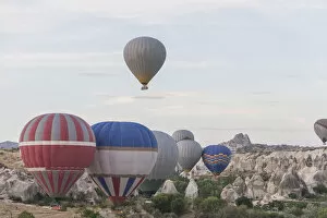 Images Dated 23rd September 2015: Hot air balloon flying over spectacular Cappadocia