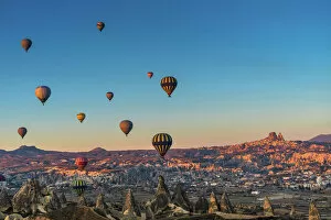 Landmark Collection: Hot air balloon flying over spectacular Cappadocia