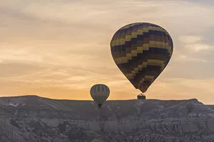 Aerial Collection: Hot air balloon flying sunset, Cappadocia, Turkey