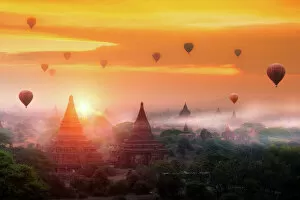 Mist Gallery: Hot air balloon over plain of Bagan in misty morning, Mandalay, Myanmar
