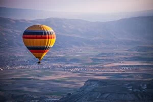 Images Dated 13th April 2014: Hot air ballooning in the sunrise in Cappadocia