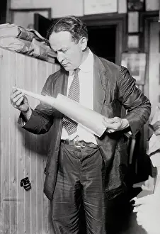 Houdini holding Collapsible Trumpet