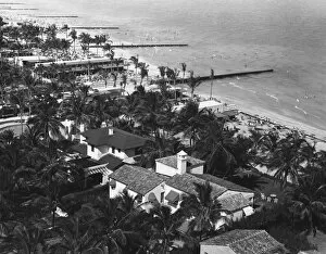 Houses at beach, (B&W), elevated view
