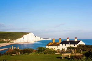 United Kingdom Gallery: Houses in front of the Seven Sisters chalk cliffs, Seaford, Sussex, England, United Kingdom
