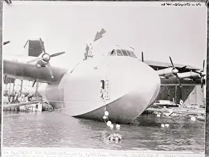 Los Angeles County Prints: Howard Hughes Atop World's Largest Aircraft