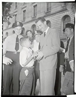 Howard Hughes Giving Autograph to Young Boy