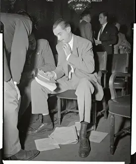 Howard Hughes Going over Notes at Senate Hearing