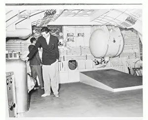 Howard Hughes Inspecting Hercules Plane