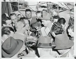 Los Angeles County Prints: Howard Hughes Being Interviewed After Test Flight of HK-1