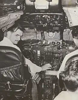 Cockpit Prints: Howard Hughes at Plane Controls