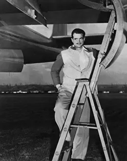 Industrialist Prints: Howard Hughes Posing With Airplane