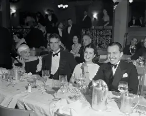 Howard Hughes Sitting with Friends