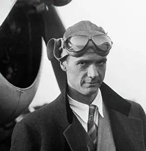 Flight Helmet Prints: Howard Hughes Standing in Front of Airplane