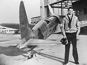 Howard Hughes Standing with His First Plane