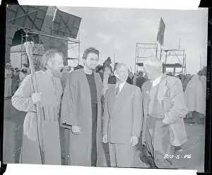 Howard Pyle Conversing with Actors on a Movie Set