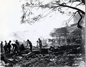 Philippines Prints: Four Howitzers Being Operated By Soldier