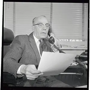 HR Gross Talking on Telephone