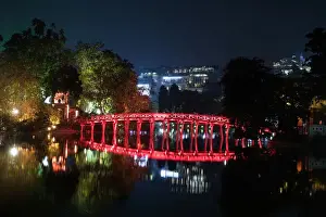 The Huc Bridge (The Huc, meaning Morning Sunlight Bridge) in Hoan Kiem Lake (Sword Lake)