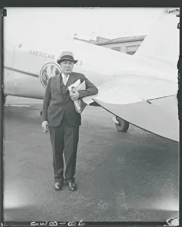 Austerity Prints: Hugh Johnson Leaning on Airplane