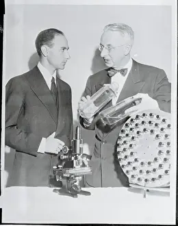 Humberto Fernandez-Moran Examining Bottles