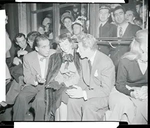 Humphrey Bogart Conferring with Colleagues