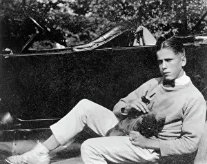Prints of Humphrey Bogart (1899-1957), Warner Bros. star, at the age of nineteen, undated The Essence of Cool: Humphrey Bogart with Dog and Pipe