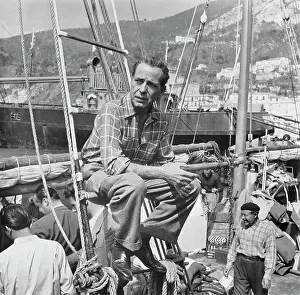 Prints of American actor Humphrey Bogart (1899 Ð 1957) sitting on the rigging of a boat during filming of the 1953 film Beat the Devil in Italy. (Photo by Pictorial Parade/Archive Photos/Getty Images) The Essence of Cool: Humphrey Bogart On A Film Set