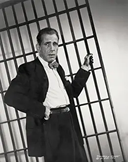 Prison Bars Prints: Humphrey Bogart with Jail Bars