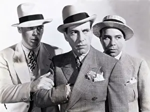 Prints of Humphrey Bogart, dressed for his role as Turkey Morgan, reaches for his gun in a scene from the 1937 film Kid Galahad The Essence of Cool: Humphrey Bogart in Kid Galahad