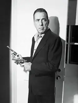 Prints of (Original Caption). Humphrey Bogart in a movie still from The Petrified Forest, released in 1936. Filed 1955 The Essence of Cool: Humphrey Bogart in Movie Still