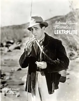 Prints of (Original Caption). Humphrey Bogart in Warner Brother's Two Against the World, ad for flameless Lektrolite. Undated photograph The Essence of Cool: Humphrey Bogart In Movie/Ad For Lighter