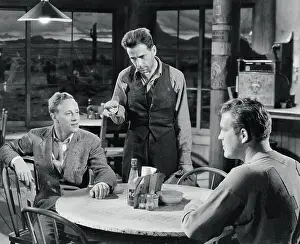 Prints of Actor Humphrey Bogart as Duke Mantee, and Leslie Howard as Alan Squier in the 1936 film The Petrified Forest The Essence of Cool: Humphrey Bogart in The Petrified Forest