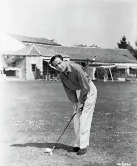 Humphrey Bogart Playing Golf
