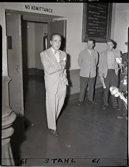 Humphrey Bogart Stands Outside Court