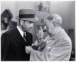 Prints of (Original Caption). Humphrey Bogart, S.Z. Sakall in Thank Your Lucky Stars. A Warner Bros. First National picture. Movie released in 1943 The Essence of Cool: Humphrey Bogart, S.Z. Sakall In Movie