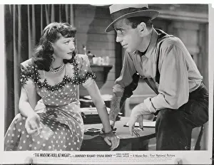 Prints of (Original Caption). The Wagons Roll at Night with Humphrey Bogart, Sylvia Sidney, with Eddie Albert and Joan Leslie. A Warner Bros. First National picture The Essence of Cool: Humphrey Bogart in The Wagons Roll at Night