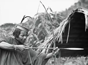 Precision Prints: Hunter with a Bow and Arrow