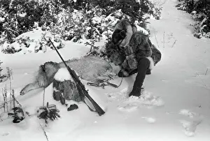 Injury Prints: Hunter Retrieving Trapped Timber Wolf
